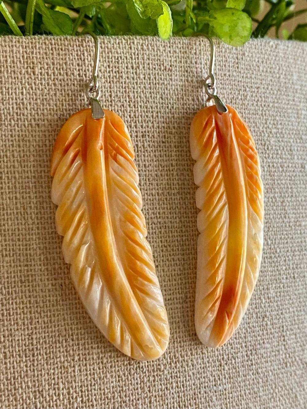 E9 Orange spiny oyster carved feather dangle sterling silver earrings